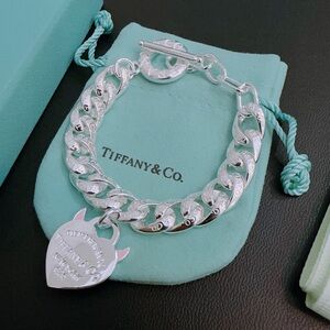Tiffany & Co. Sterling Silver Curb Link Bracelet with Pink-Accent Heart Tag